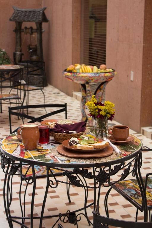 Mexican breakfast at a colorful table in Mexico Lindo restaurant