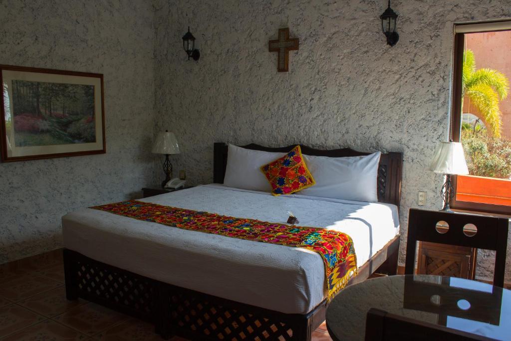 Mexican-style hotel accommodation with colorful textiles, view 3